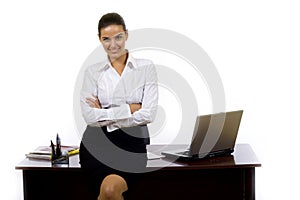 Businesswoman against office desk