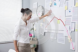 Businesswoman analyzing a financial chart