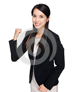 Businesswoman with arm fist