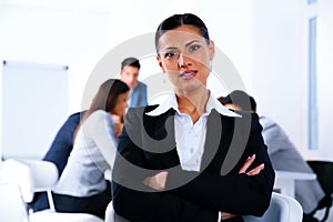 Businesswoman with arms folded