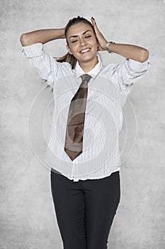 Businesswoman arranges her hair, seductive movements