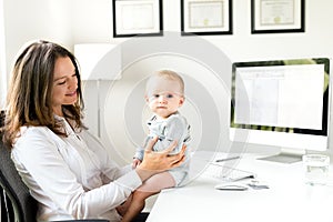 Businesswoman with Baby