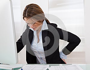 Businesswoman with back pain