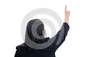 Businesswoman with back to camera touching display copyspace