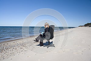 Businesswoman on beach