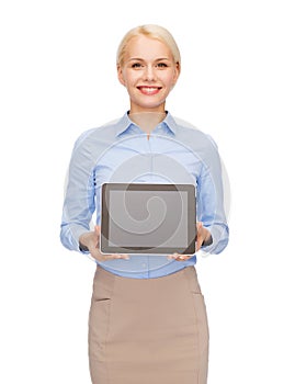 Businesswoman with blank black tablet pc screen