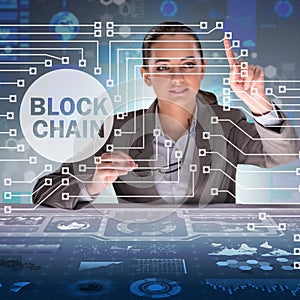 The businesswoman in blockchain cryptocurrency concept