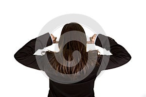 Businesswoman with both fingers in the ears
