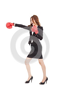 Businesswoman boxing and competition concept