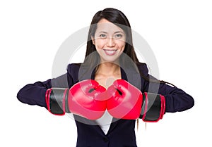 Businesswoman boxing punching with hands