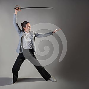 A businesswoman in a business casual suit attacks competitors,