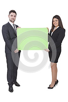 Businesswoman and businessman keeping signboard