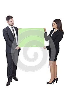 Businesswoman and businessman keeping signboard