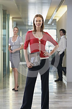 Businesswoman with Businesspeople in Background