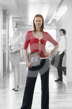 Businesswoman with Businesspeople in Background