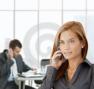 Businesswoman busy in office