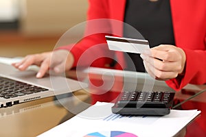 Businesswoman buying online with credit card