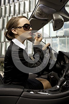 Businesswoman in a cabrio photo
