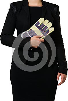Businesswoman carrying gloves