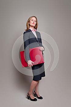 Businesswoman carrying portfolio