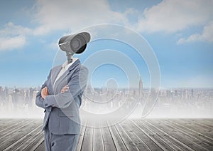 Businesswoman with CCTV head with city skyline