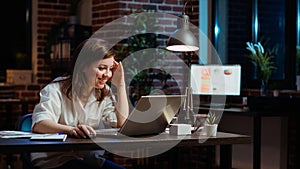 Businesswoman celebrating finalizing agreement with client