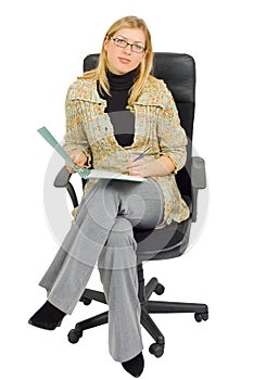 Businesswoman in a chair with paperwork