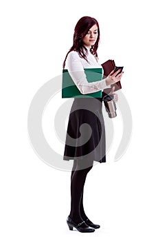 Businesswoman checking mails on her smartphone