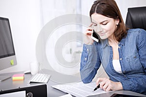 Businesswoman checking a report