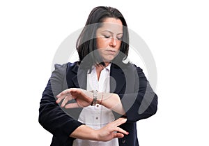 Businesswoman checking time looking at wristwatch