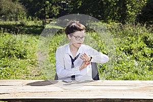 Businesswoman checking what time