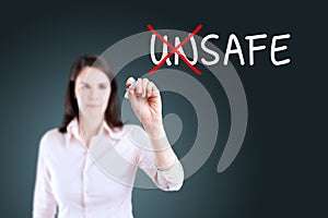 Businesswoman choosing Safe instead of Unsafe. Blue background.