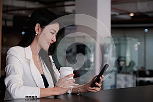 A businesswoman completes KYC using an online banking program in order to open a digital savings account. The definition