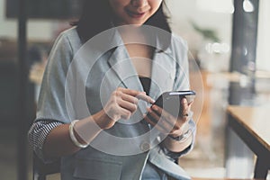 A businesswoman completes KYC using an online banking program in order to open a digital savings account. The definition