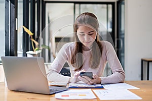 A businesswoman completes KYC using an online banking program in order to open a digital savings account. The definition