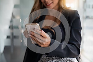 A businesswoman completes KYC using an online banking program in order to open a digital savings account. The definition