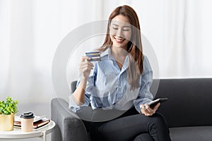 A businesswoman completes KYC using an online banking program in order to open a digital savings account. The definition