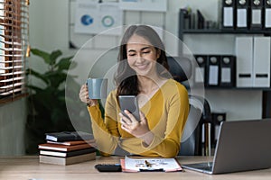 A businesswoman completes KYC using an online banking program in order to open a digital savings account. The definition