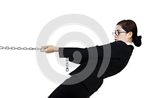 Businesswoman in control isolated in white