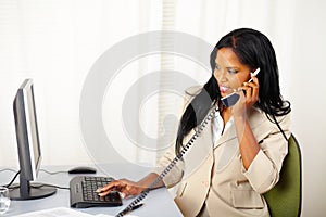 Businesswoman conversing on phone