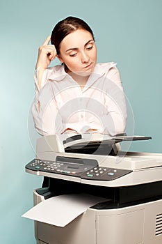Businesswoman with copier