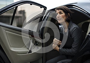 Businesswoman Corporate Taxi Transport Service Concept photo