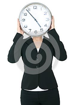 Businesswoman Covering Her Head With Clock