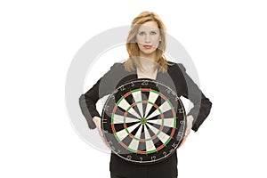 Businesswoman with dart board