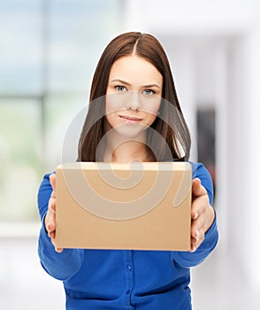 Businesswoman delivering box