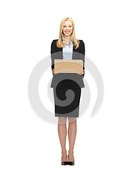 Businesswoman delivering cardboard box