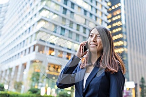 Businesswoman discuss on cellphone