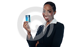 Businesswoman displaying credit card