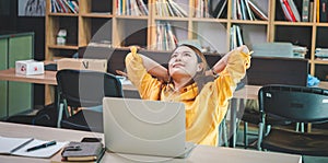 businesswoman is doing a relaxing pose to relieve fatigue after working for a long time