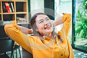 businesswoman is doing a relaxing pose to relieve fatigue after working for a long time